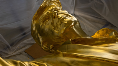 ‘Don Colossus,’ a Golden Statue of President Trump, Waits for Its Home